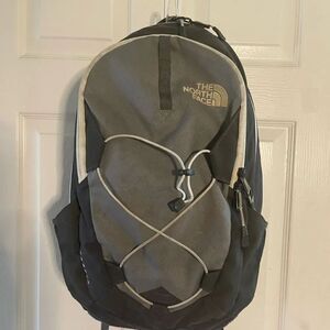 The North Face shades of gray large Backpack beige trims